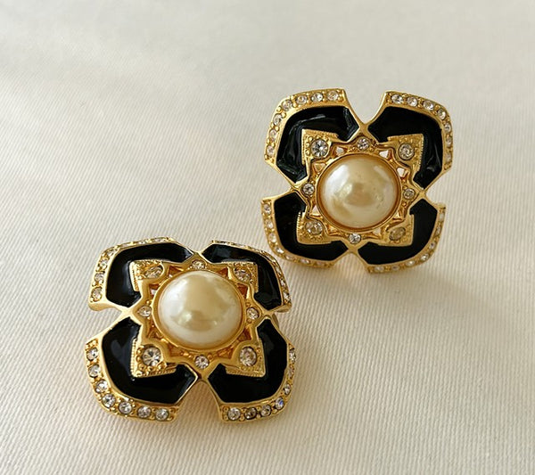Classic large statement style clip earrings.