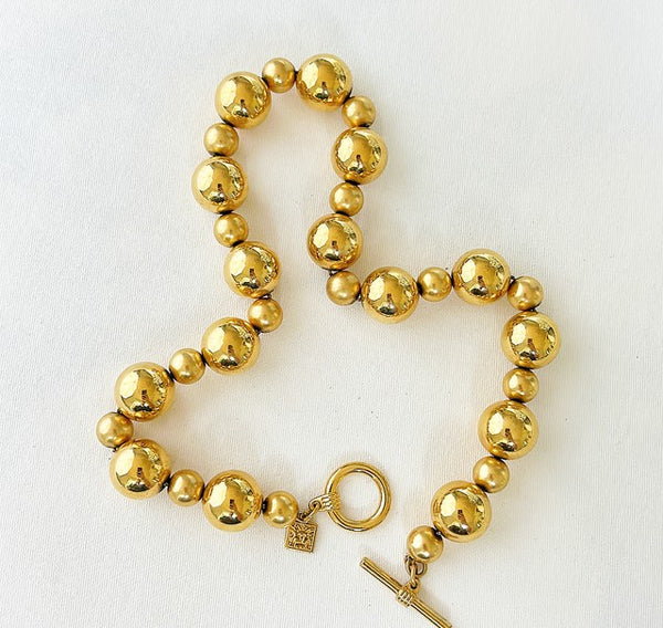 80s signed Ann Klein shiny gold metal beaded necklace.