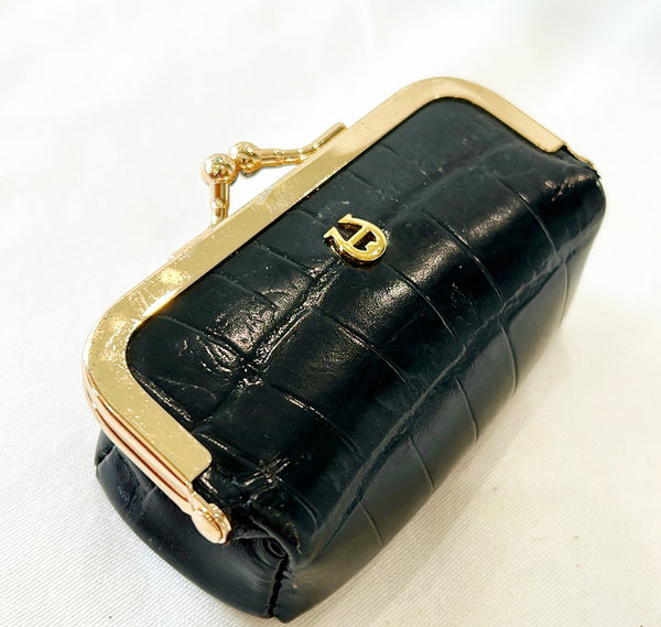 Vintage Etienne Aigner lipstick purse.