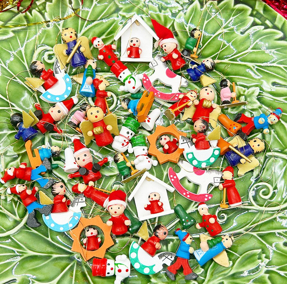 Vintage miniature wooden painted Christmas tree ornaments.