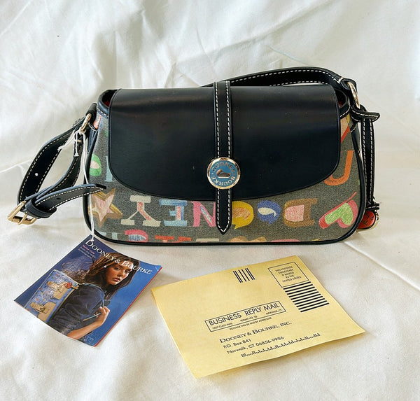 Vintage Never used Dooney & Burke “It bags” rainbow colors out of their signature.