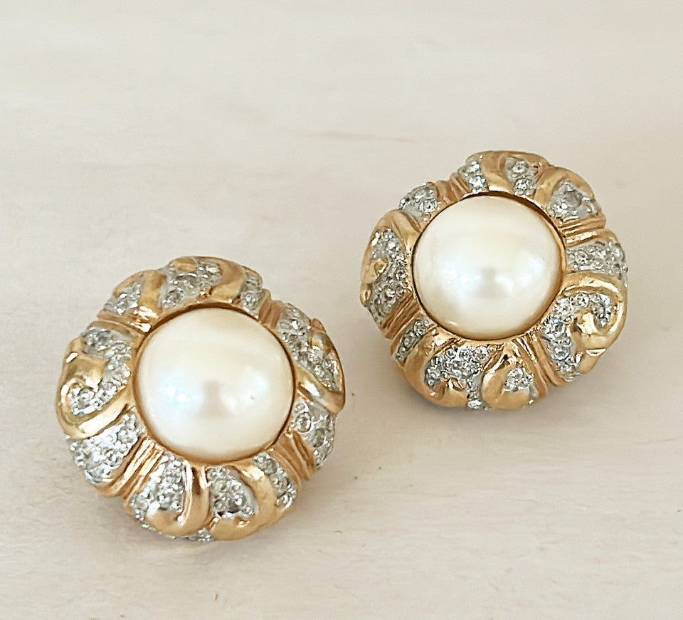 Classic vintage signed clip on pearl earrings signed by Vogue Bijoux.