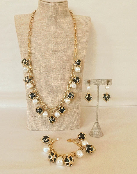 Tori Spelling signed jewelry set includes the long necklace 32” long - adjustable length,
