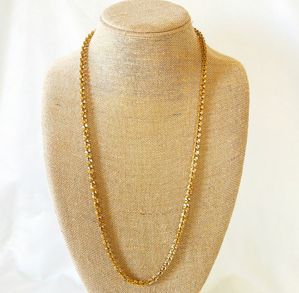 Beautiful vintage 80s long gold tone metal necklace with interlocking style squares as the chain design.