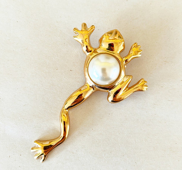 1980s vintage frog brooch with large round faux pearl accent.