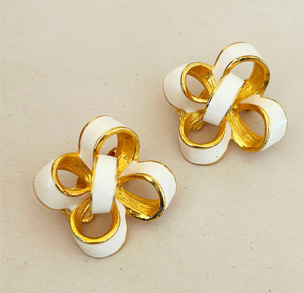 Vintage signed Donald Stannard bow style clip on earrings.