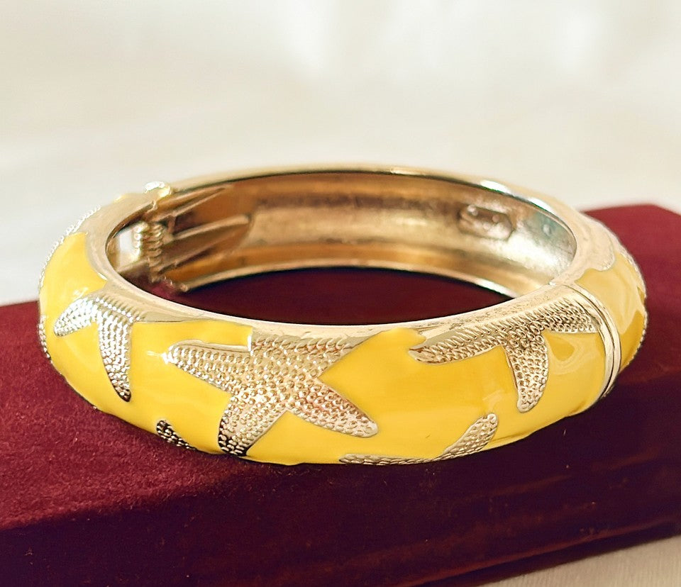 Vintage 90s stamped Squire metal fashion hinged bracelet.