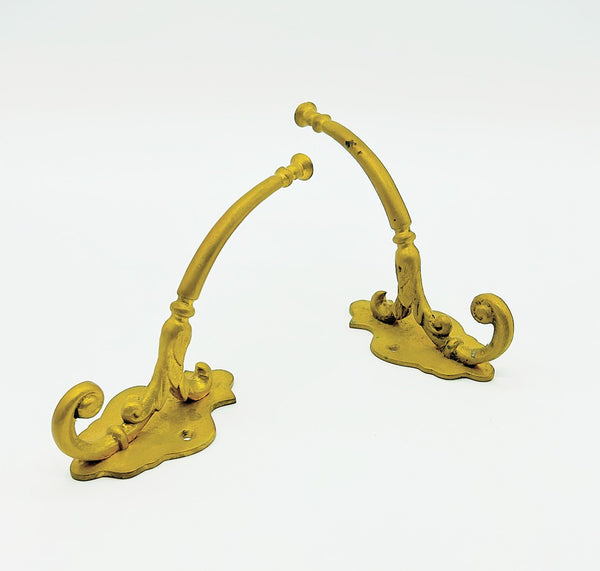 Pair of 80s solid brass decorative matching wall hooks