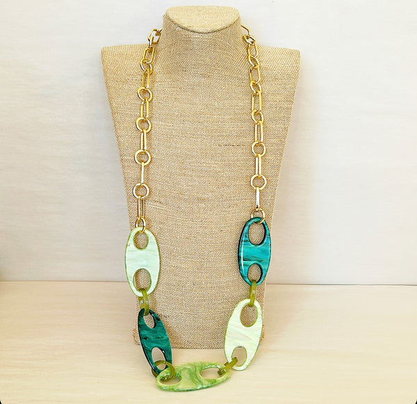 Bold statement necklace with acrylic green on green oval front link accents