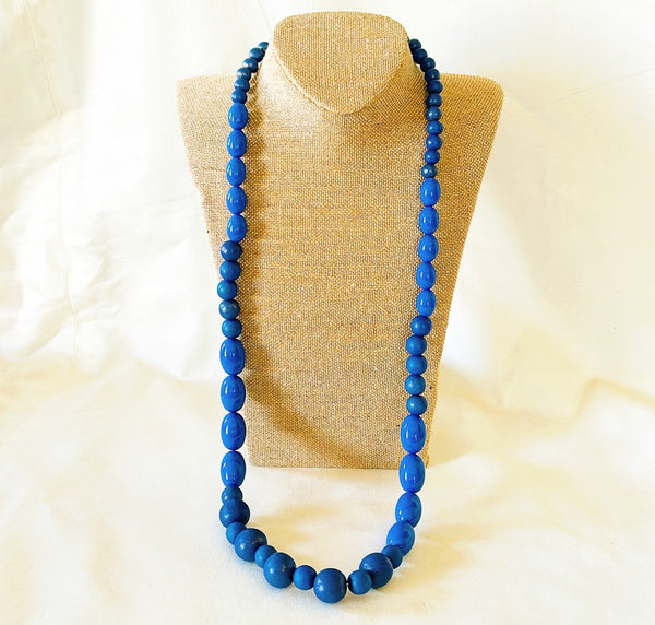Big beautiful royal blue beaded long designer style necklace.