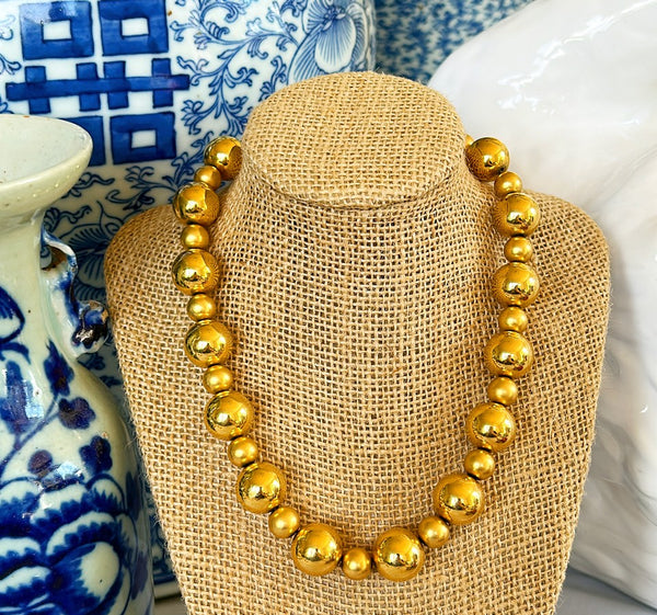 Classic 1980s Ann Klein gold metal beaded designer necklace.