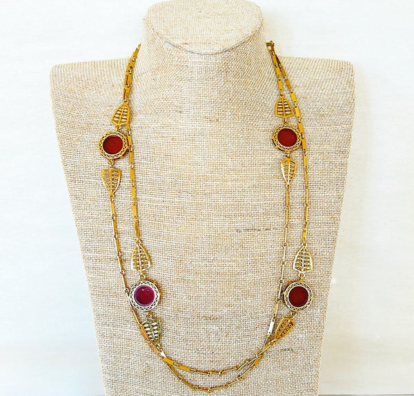 90’s long gold link necklace with red round glass accents.