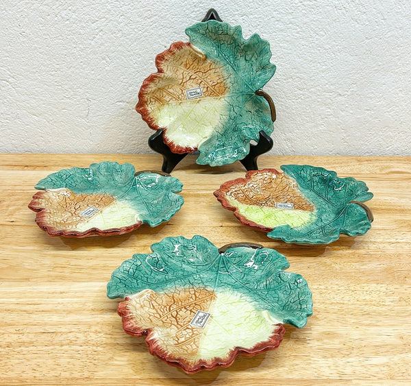 Set of 4 vintage majolica style stamped Fitz & Floyd decorative plates.