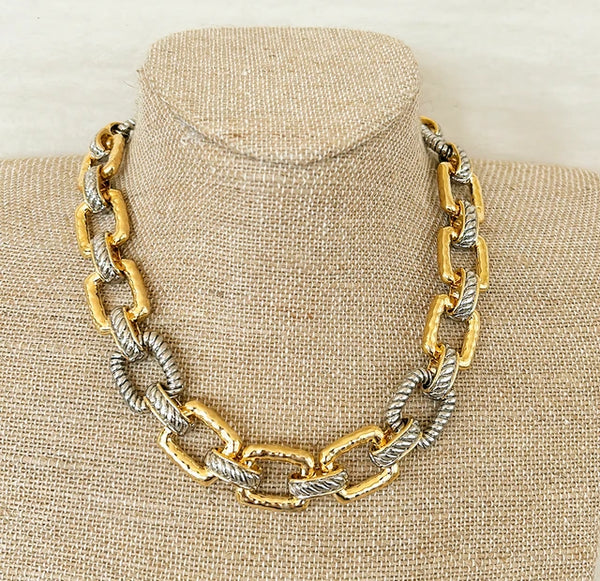 Chunky 2 tone gold / silver metal link style necklace.