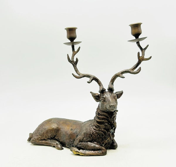 Amazing rare decorative vintage stage deer candlestick holder.