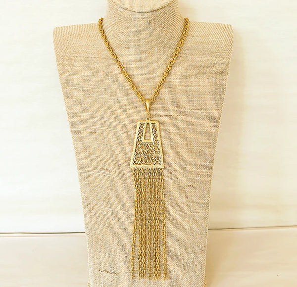 1970s gold statement necklace with dangling tassel design pendant