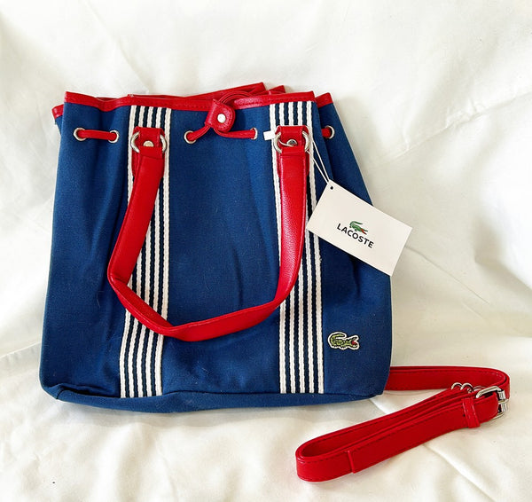 Vintage 80s LACOSTE hand bag. Fabric in blue with a blue / white trim detail.
