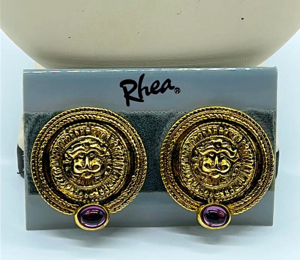 Vintage Rheas clip on designer fashion earrings.