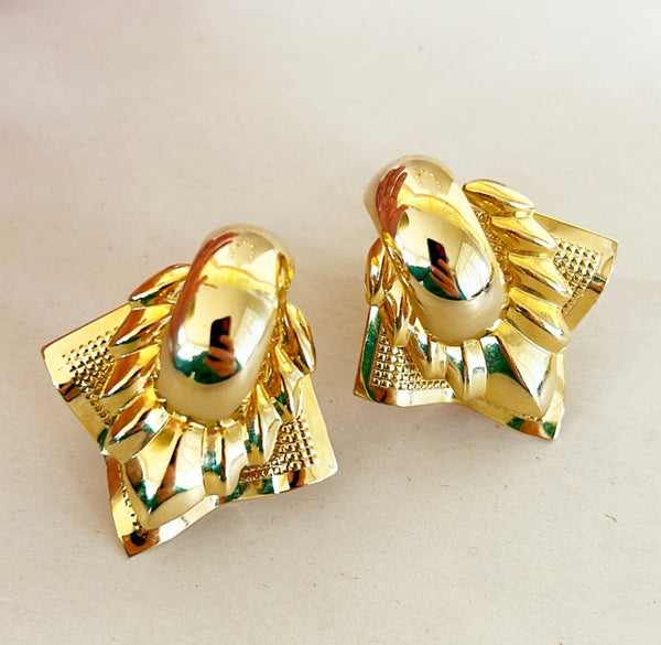 80’s large scale statement clip on earrings.