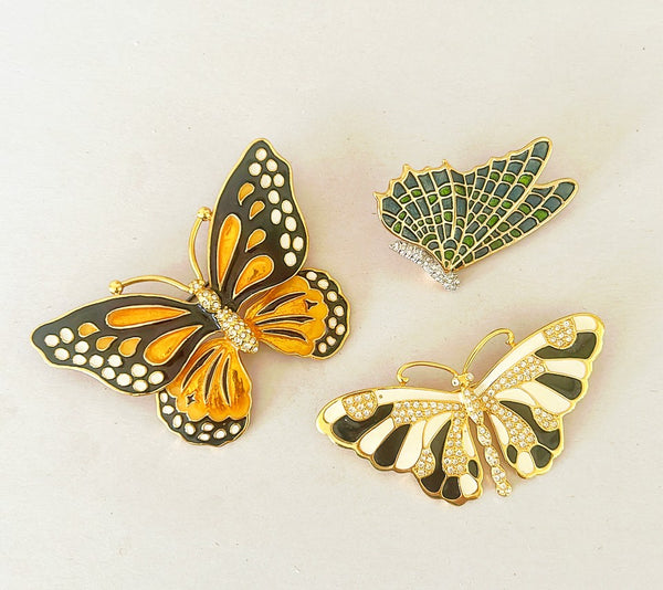 Vintage set of three signed Kenneth Jay Lane butterfly brooches.