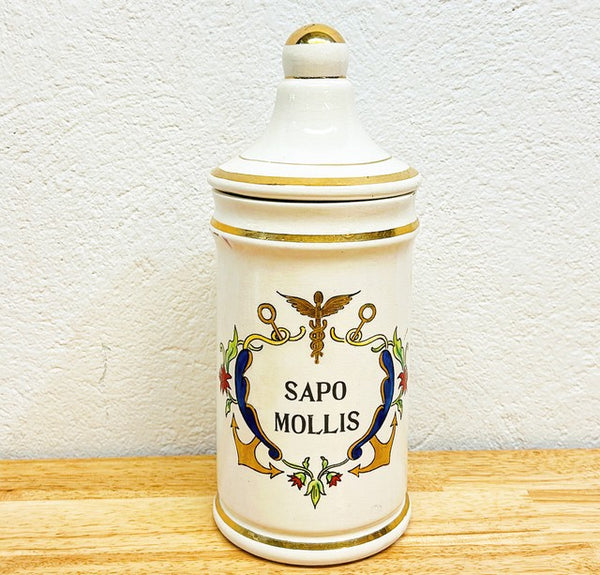 1970s vintage stamped pharmacist bottle with lid made by Jeanne Robinette ceramics.