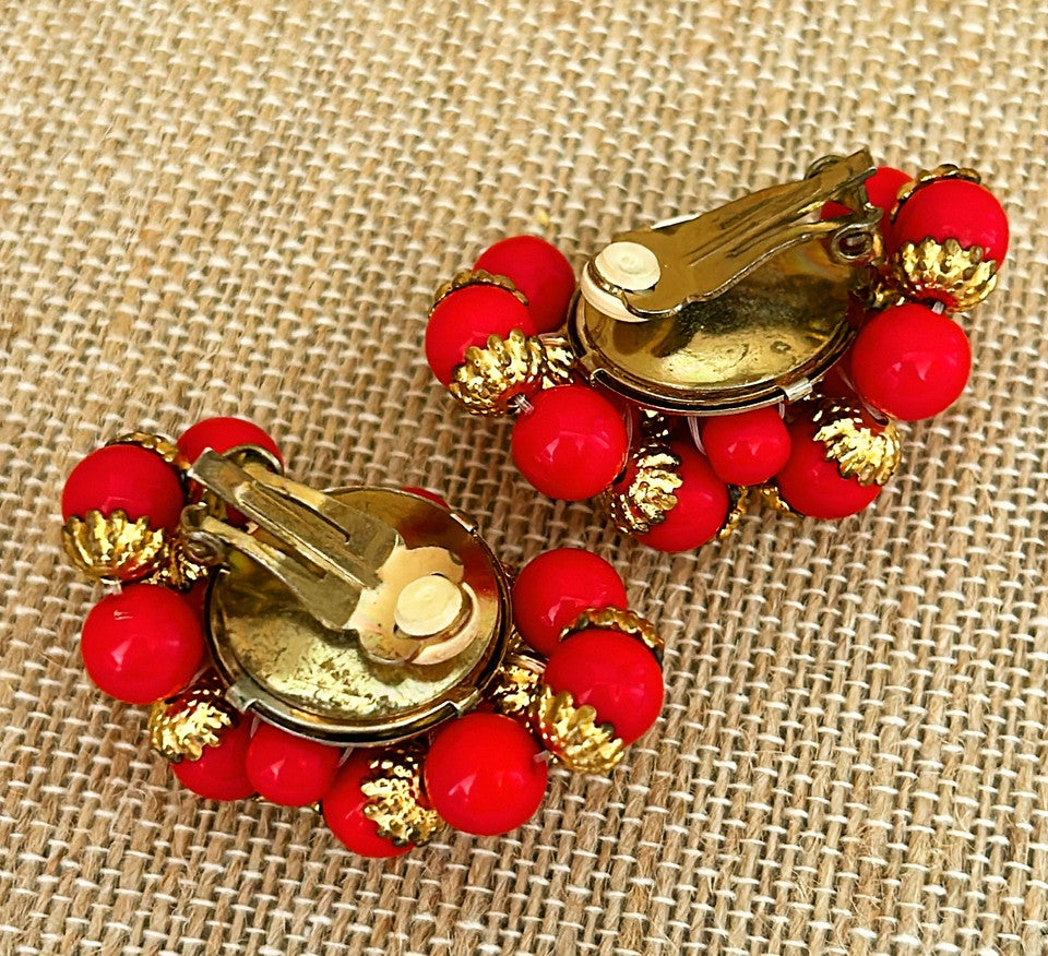 Bold vintage red beaded clip on earrings from the 70s.