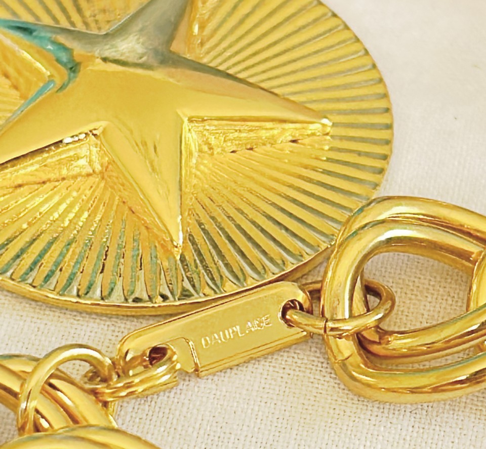 Fabulous thick gold metal chain with star pendant.