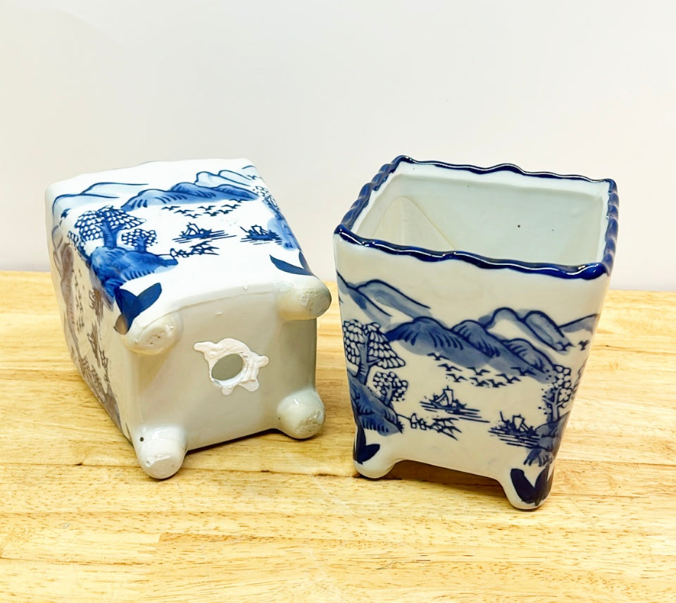Pair of matching blue & white chinoiserie style square porcelain planters.
