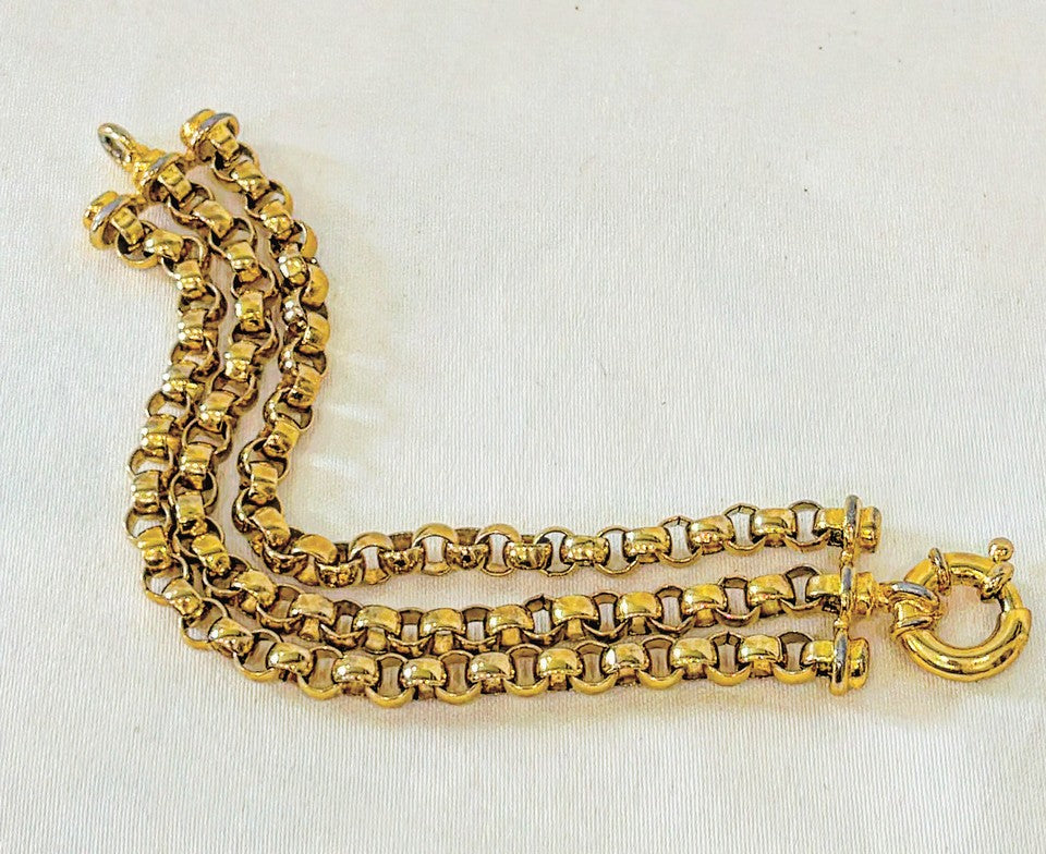 Vintage gold tone 3 strand link bracelet with thick style clasp.