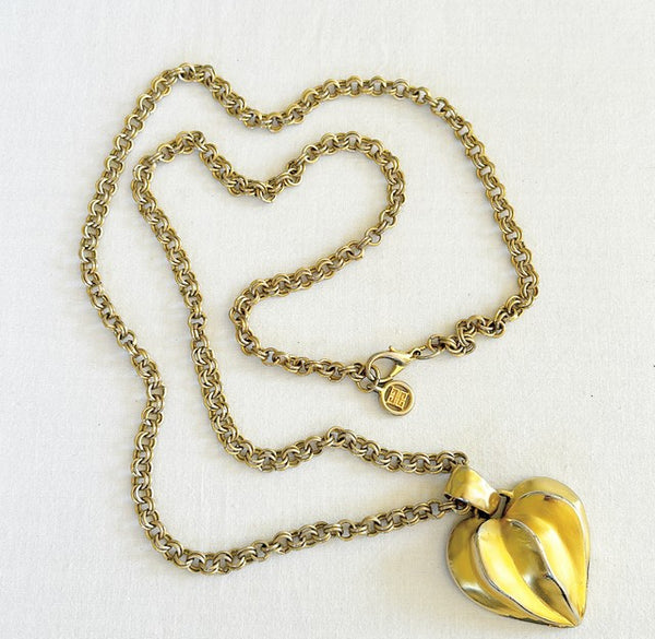 Fabulous rare 1970s signed Givenchy long heart charm pendant necklace.