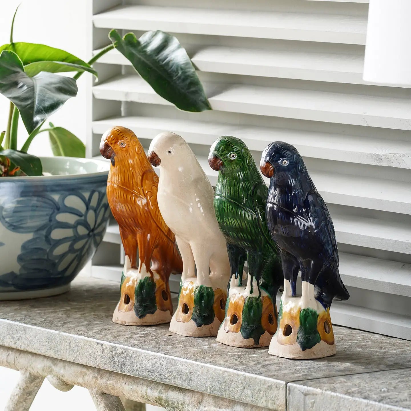 The colorfully glazed Hand-Painted Porcelain Bird