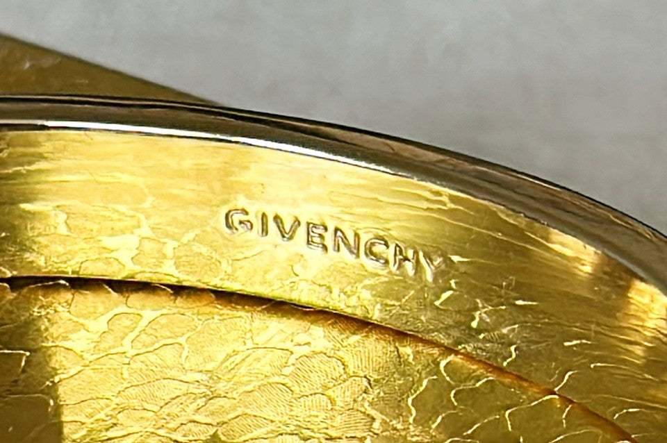 Rare early 90s stamped GIVENCHY bangle bracelet with working clasp that opens.