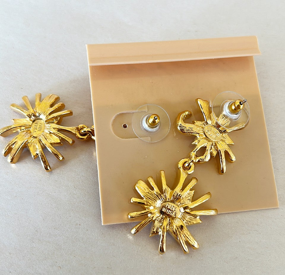 Glamours modern pierced earrings signed by Kenneth Lane