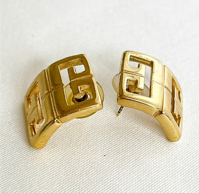 Classic 80s Givenchy Gs vintage 1980s pierced earrings.