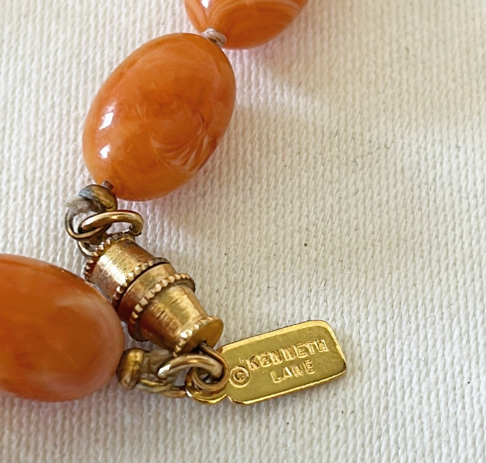 Vintage signed Kenneth Lane amber style beaded statement necklace.