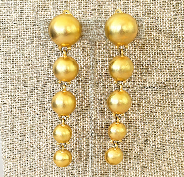 80s signed Ben Amun statement size gold ball dangling clip on earrings.