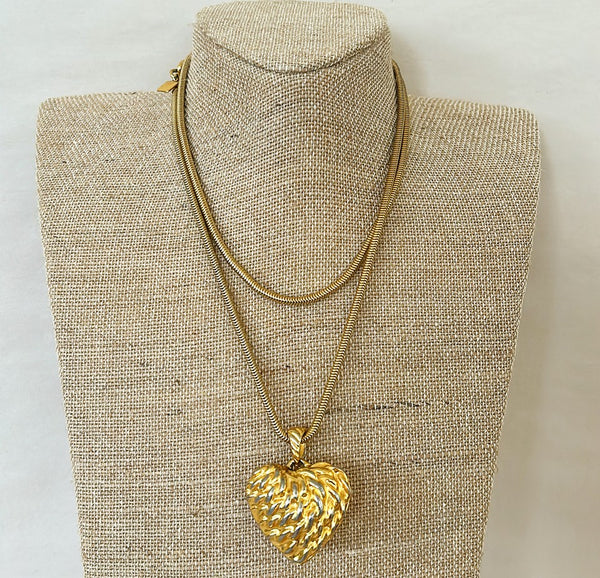 Anne Klein signed 80s gold tone necklace with large strawberry style shaped heart pendant.