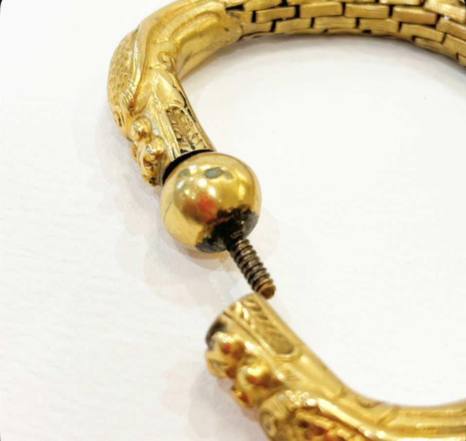 Vintage gold metal chinoiserie double headed dragon bracelet.