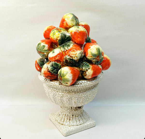 Fun vintage strawberry topiary in white crackle style urn.