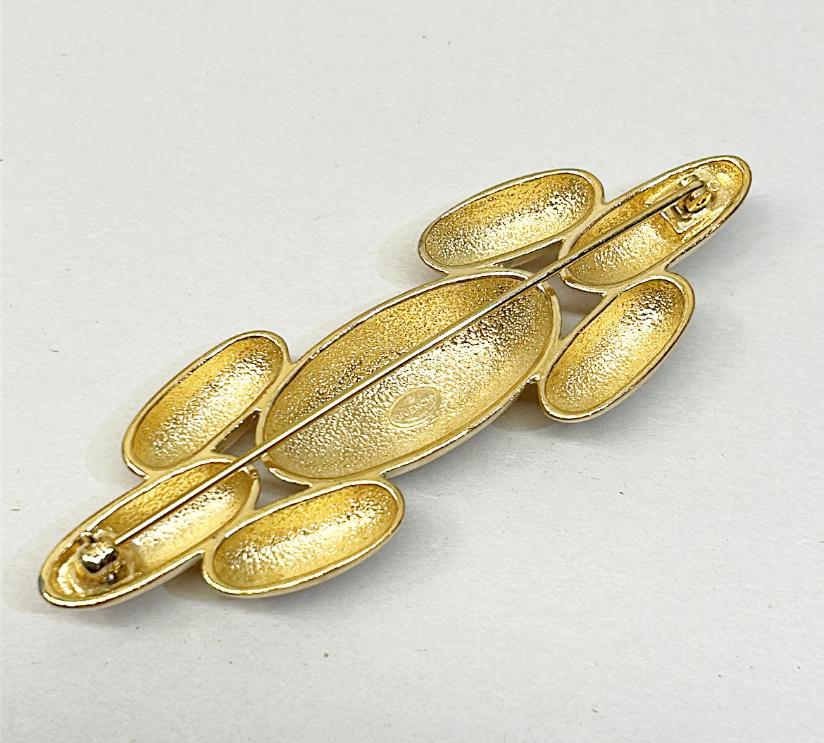 Vintage modern style signed Givenchy brooch.