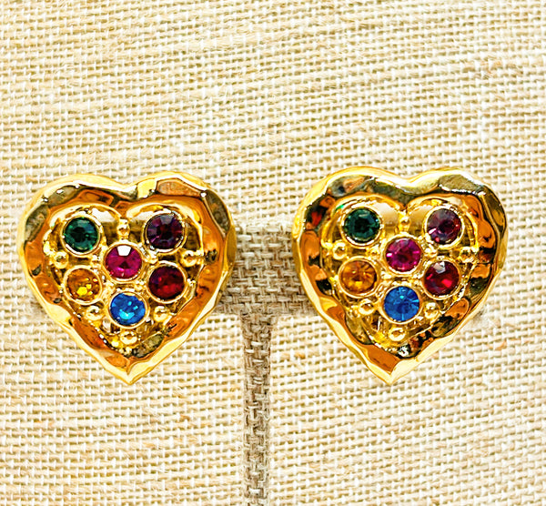 1980s vintage clip on heart shaped earrings with multi colored crystal accents.
