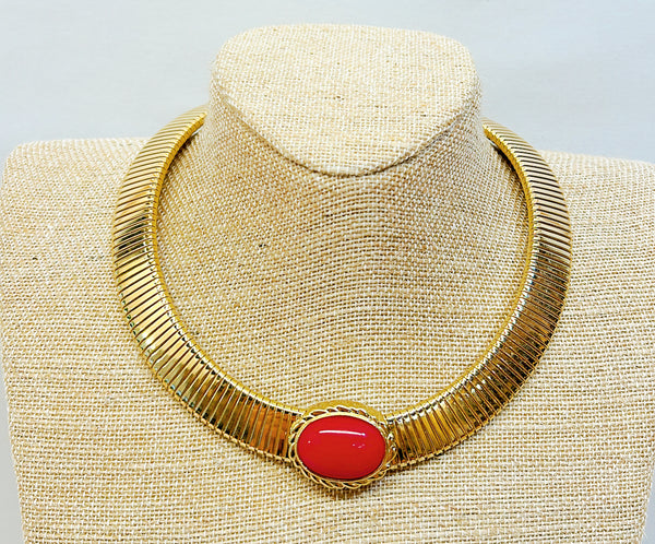 Classic 80s signed Monet omgea necklace with center oval Chinese red colored cabochon style stone.