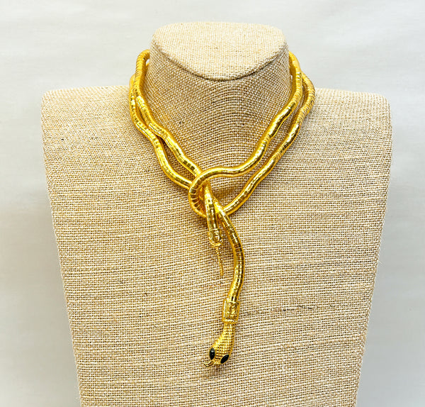 Gold metal flexible snake style necklace or bracelet.