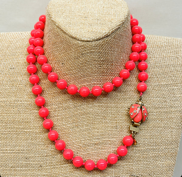 Vintage rare J Crew signed hot pink beaded lady bug necklace.
