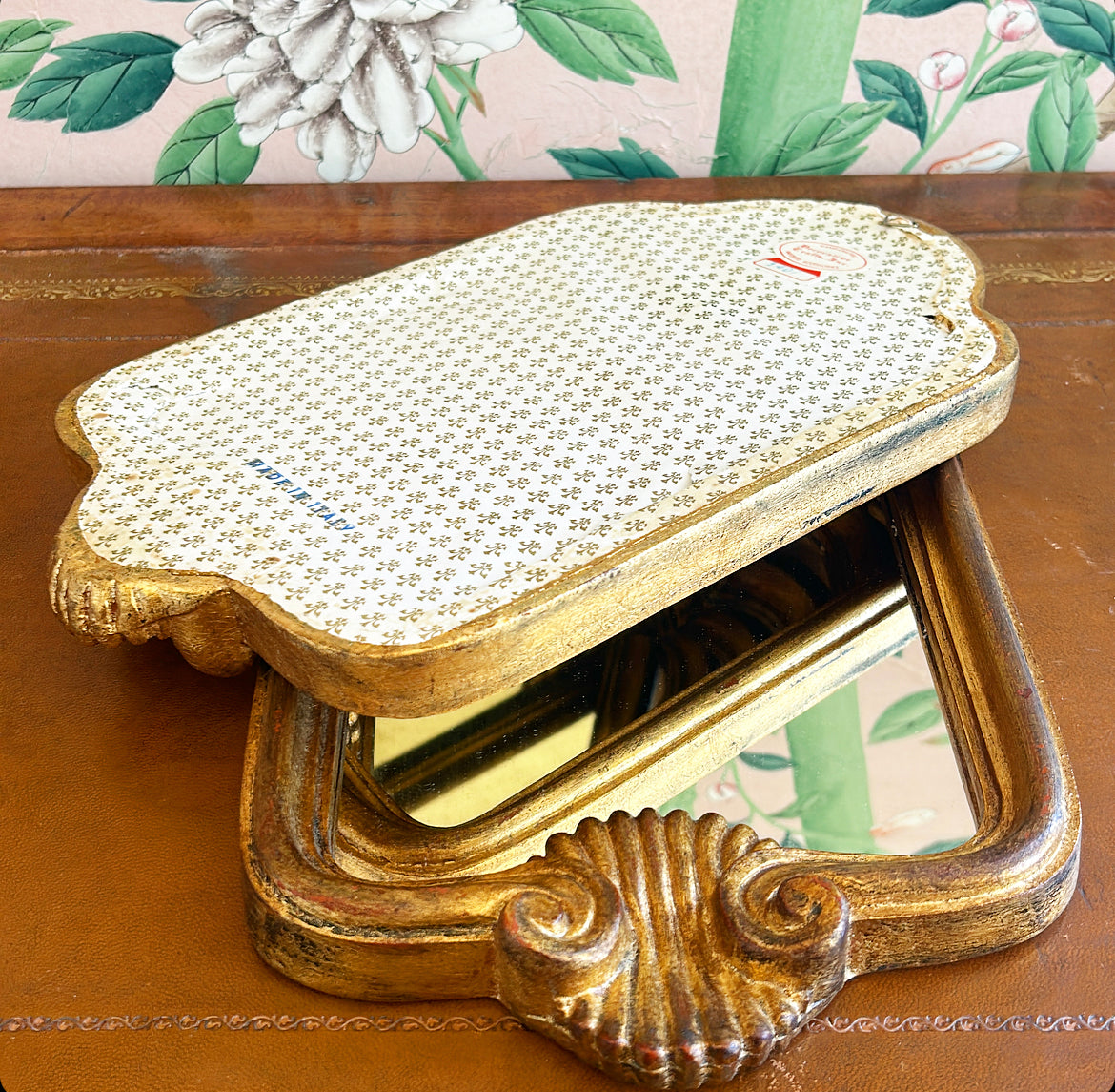 Pair of vintage Italian Florentine style shell wooden carved mirrors.