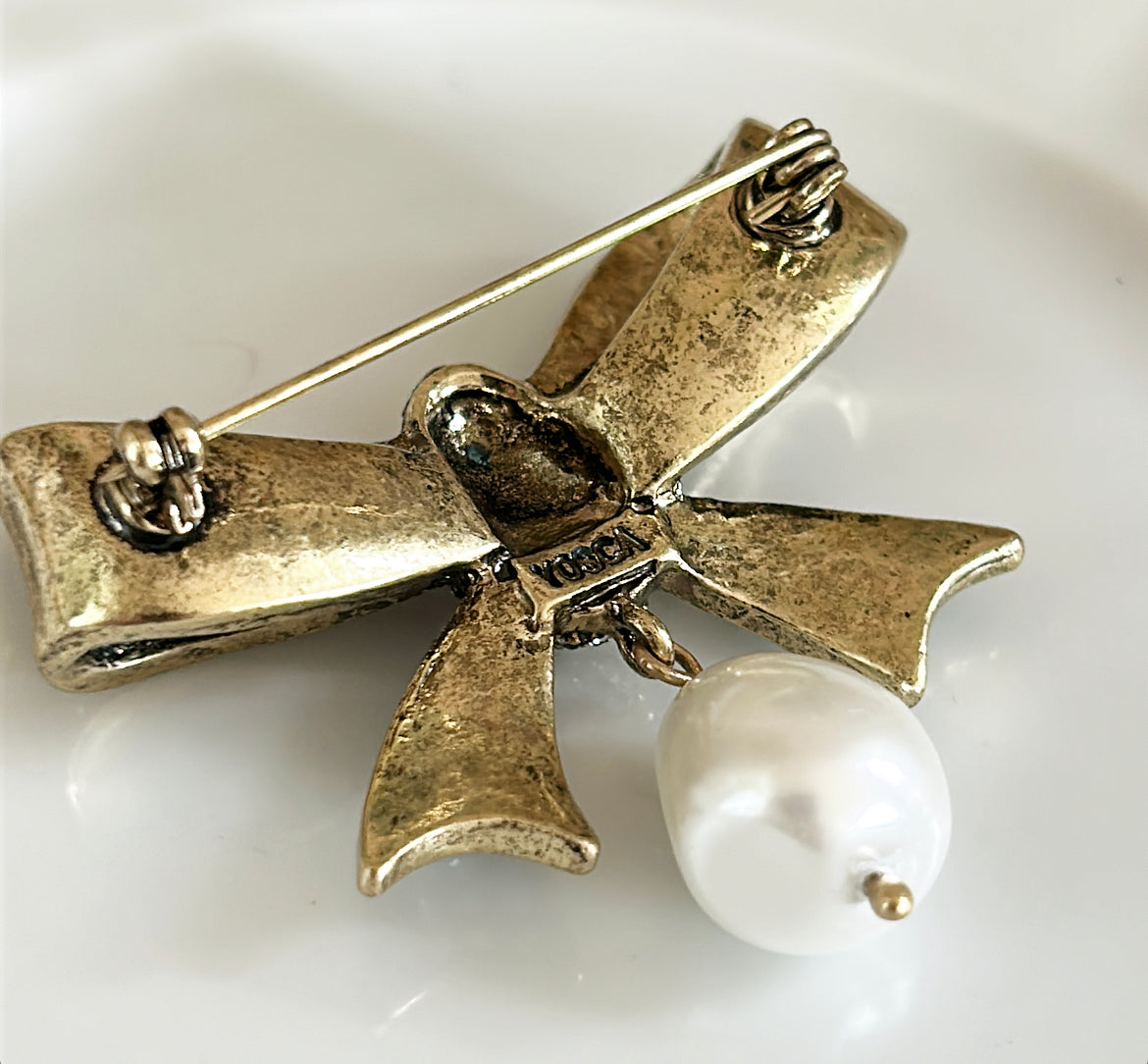 Vintage Yosca signed bow brooch with faux pearl