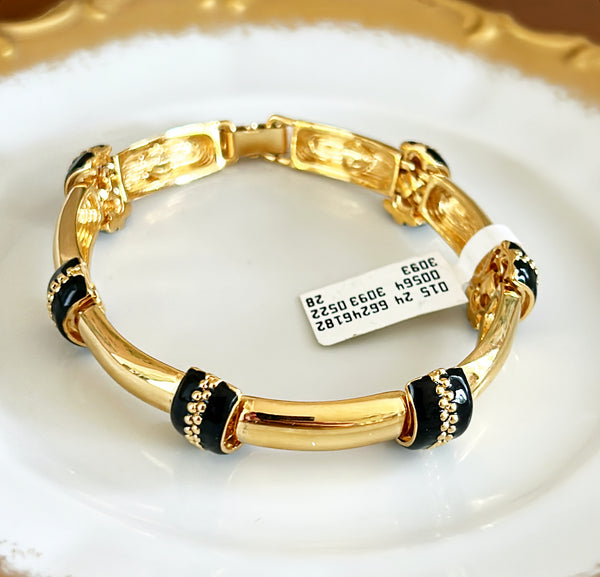 90s signed St.John designer gold link metal bracelet with black enamel accents.