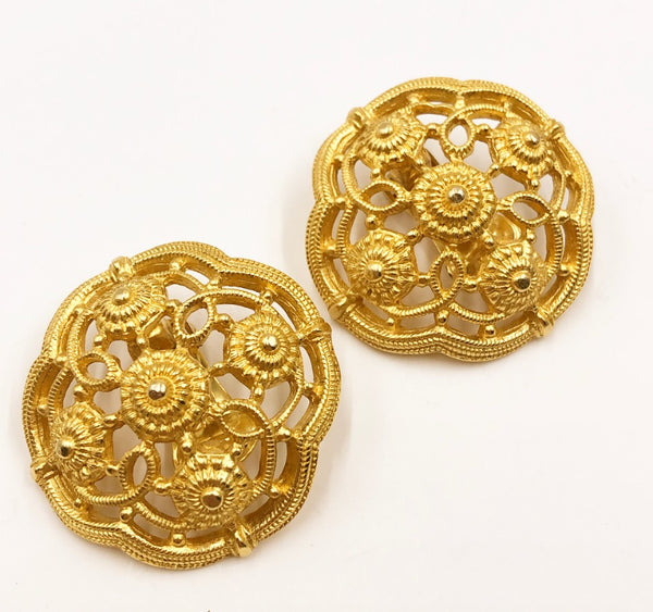 90s designer clip on earrings- larger statement pieces.