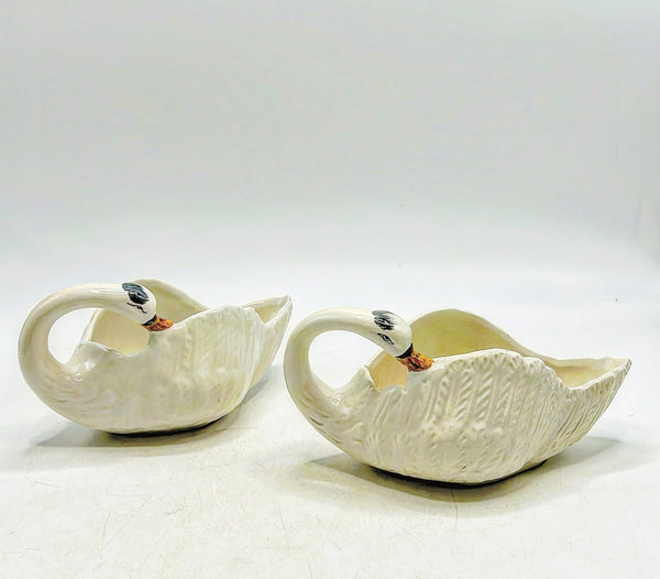 Pair of vintage 80s white matching swan planters.