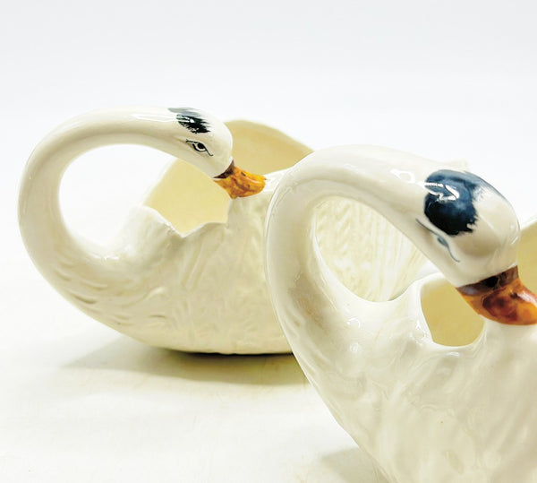 Pair of vintage 80s white matching swan planters.
